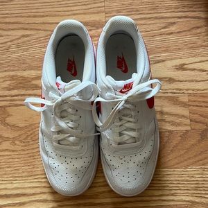 Red and white Nike Court Royales. 10